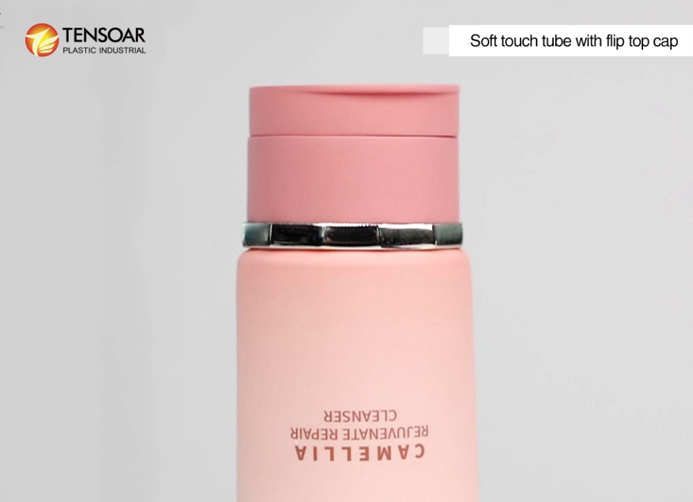 Soft touch tube with flip top cap